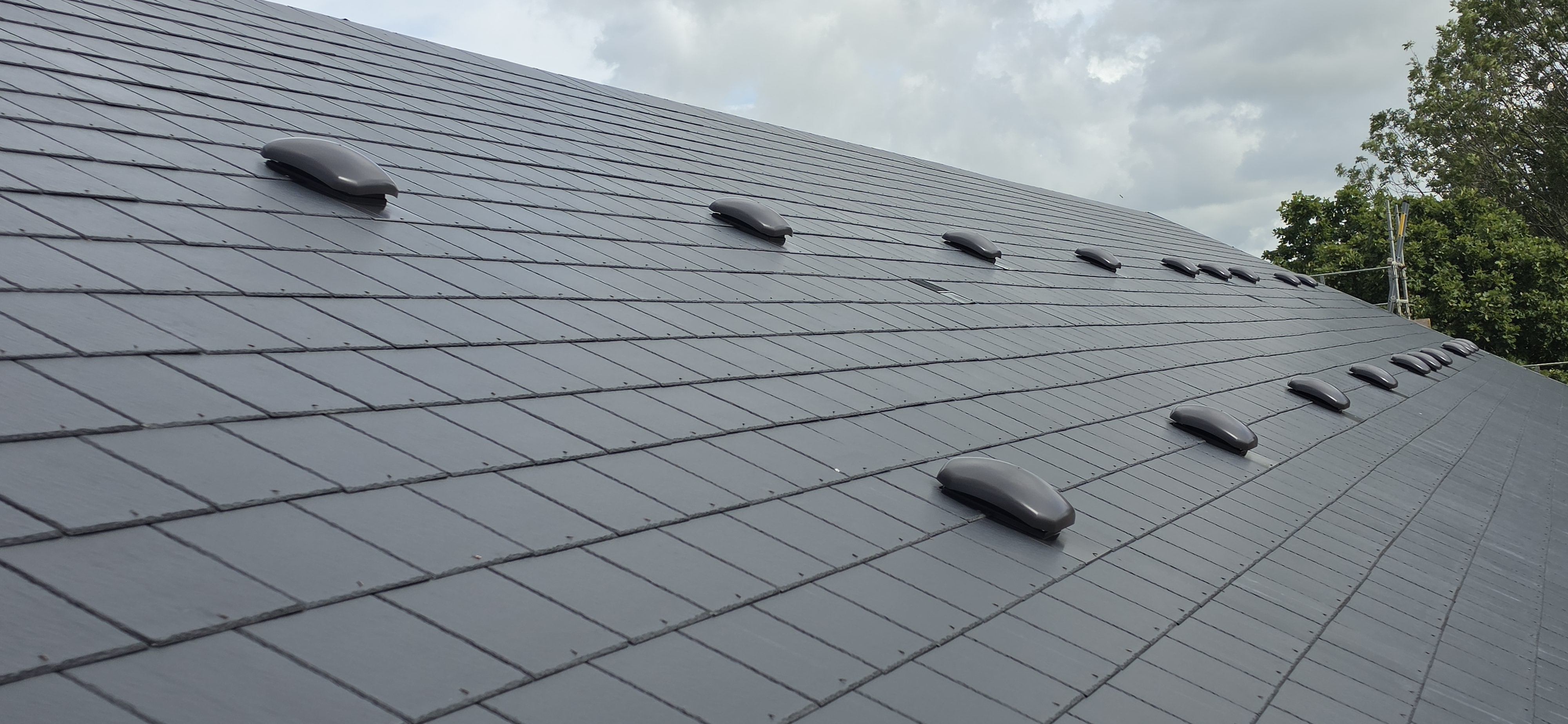 Renewed roof covering and ventilation details at The Courtyards