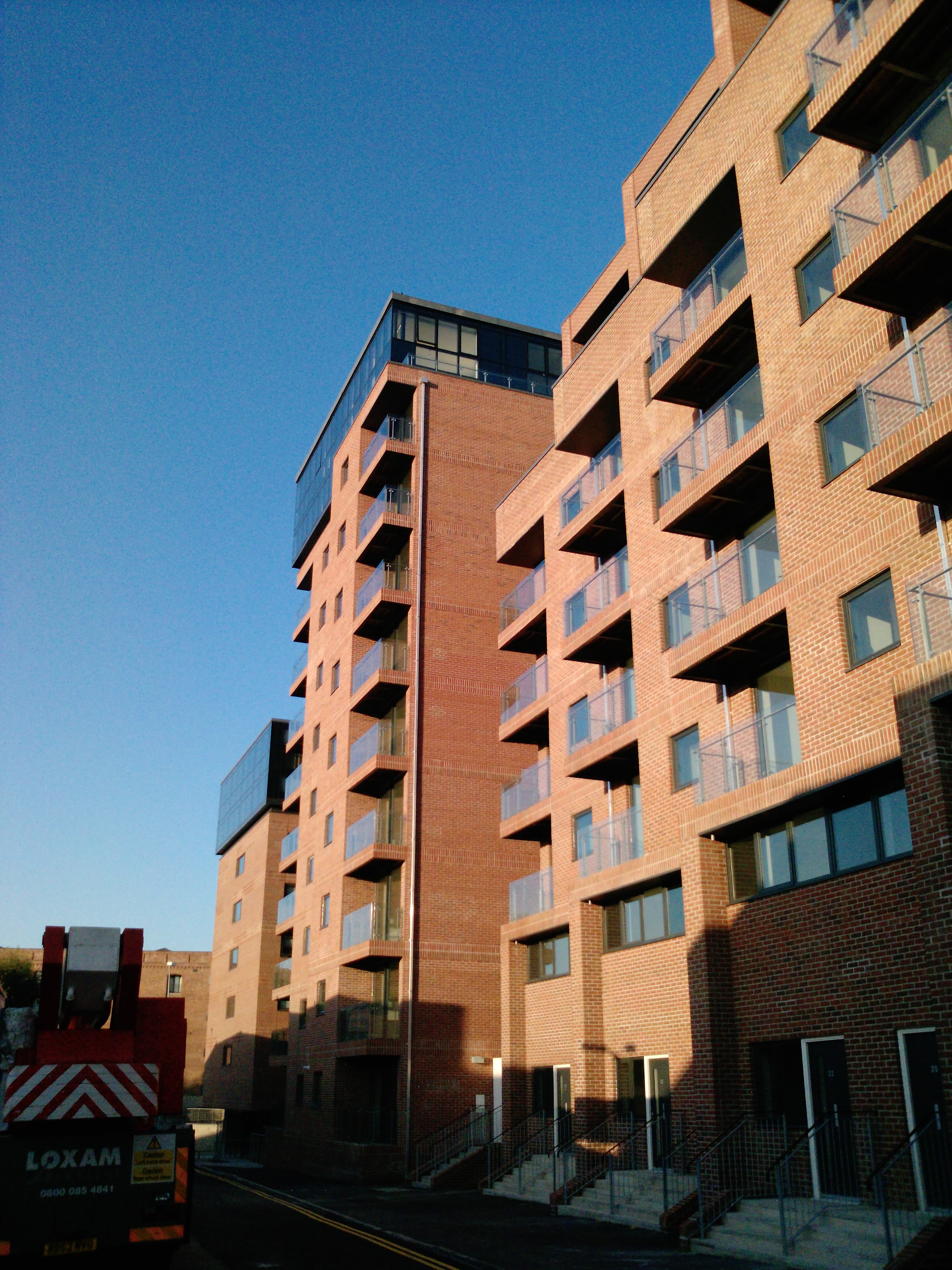 Site photograph — residential elevations during construction