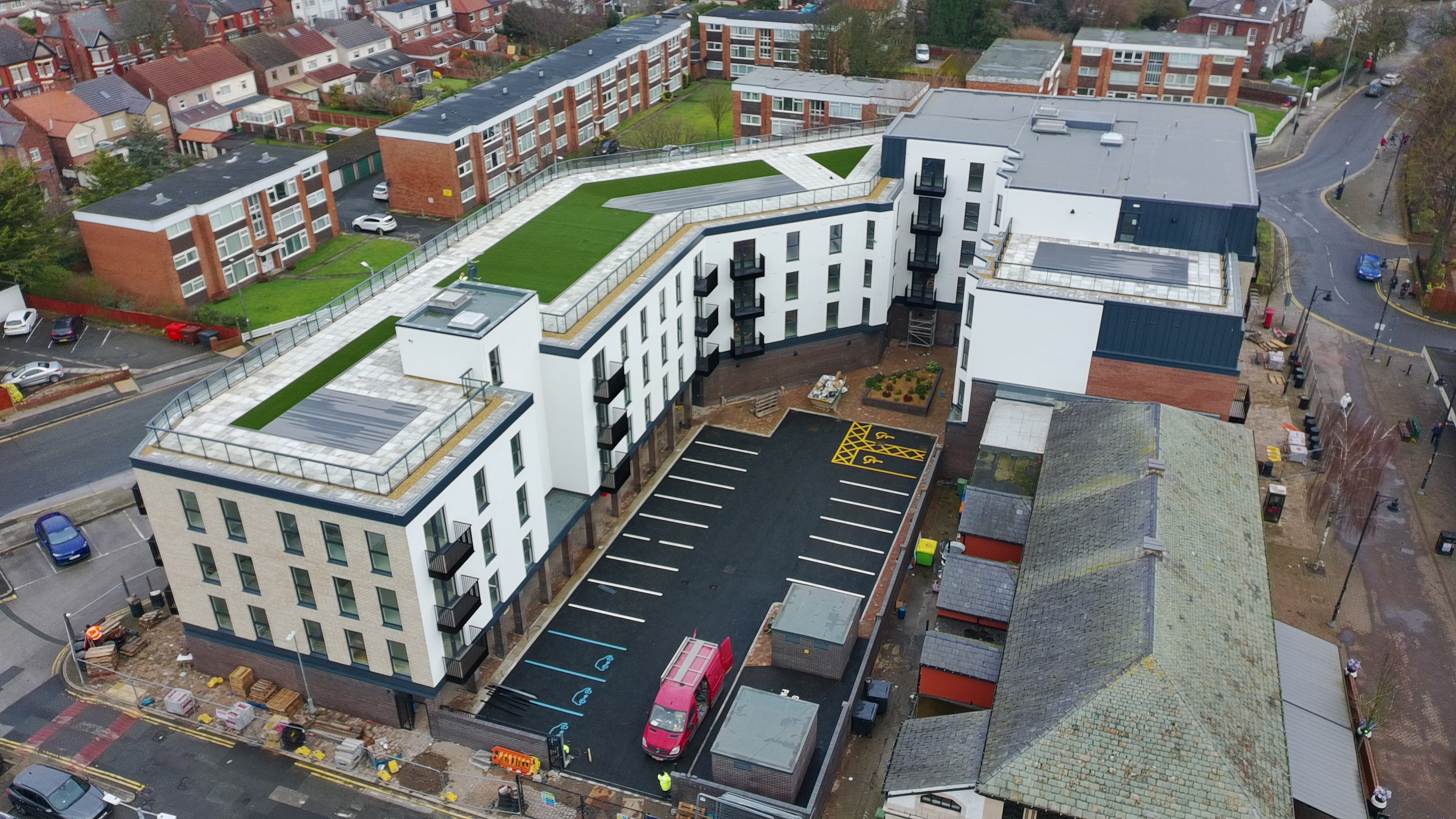 Rear elevation, courtyard and parking areas at Moorside Place