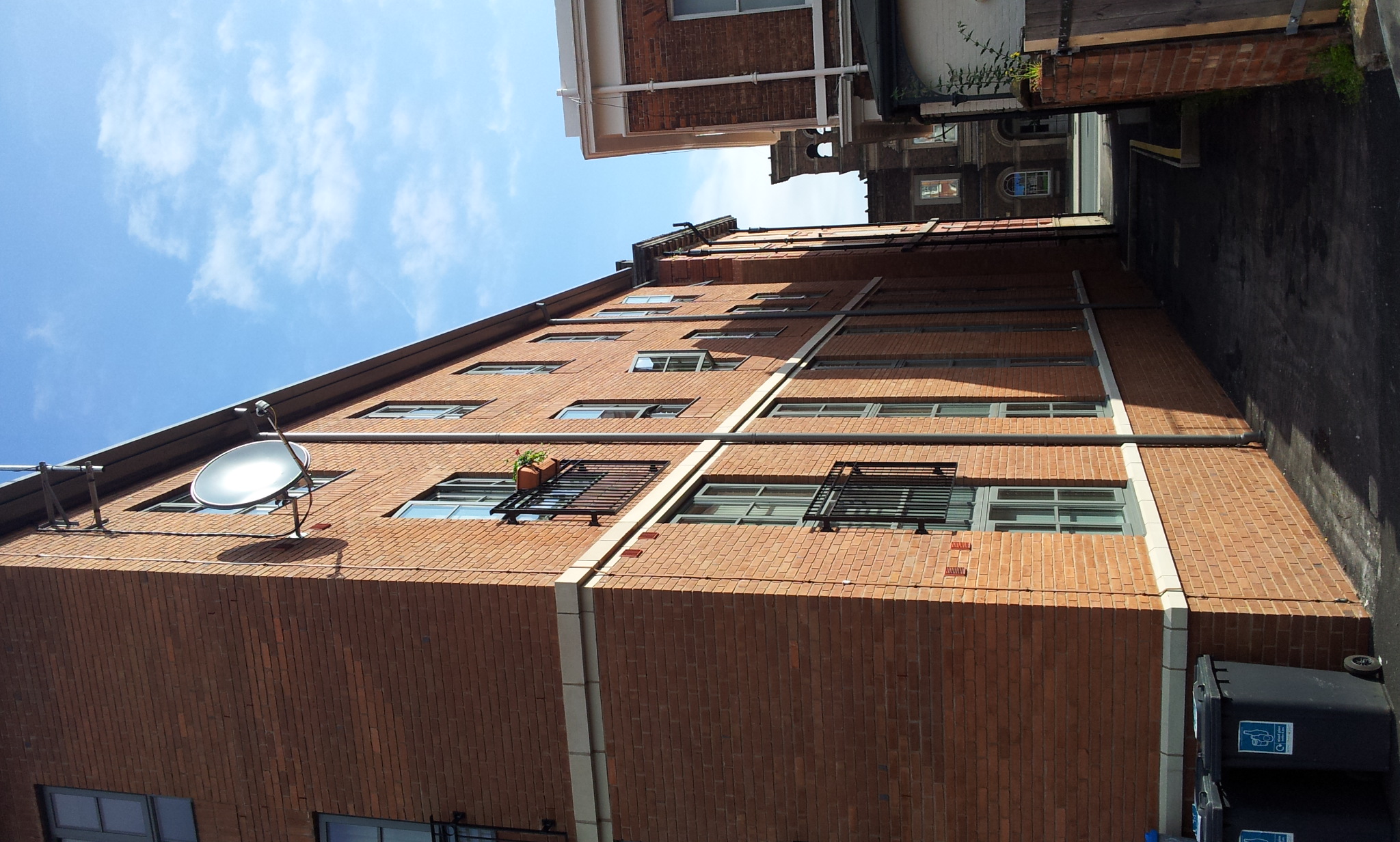 Side passage and new-build residential elevation at Old Post Office, Chester